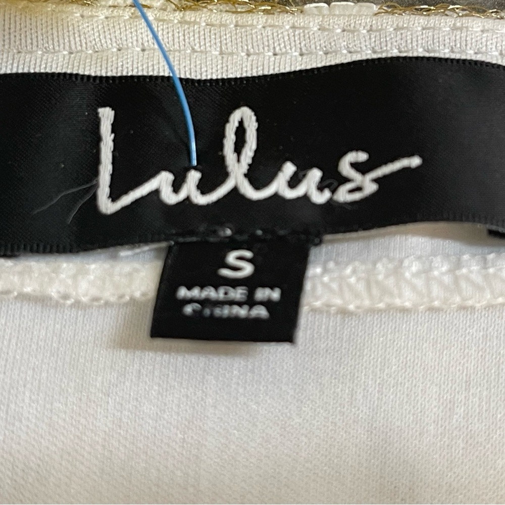 EUC Lulus mini skirt. Cream tassels,  lined, side zipper. 16.5” long. Size Small - Picture 3 of 7